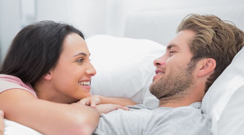 young couple in bed